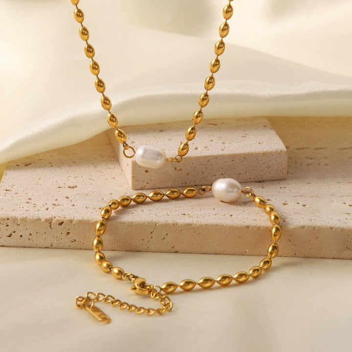European and American ins style Internet celebrity necklace women's niche non-fading natural freshwater pearl oval gold bean titanium steel necklace Glossy.pk