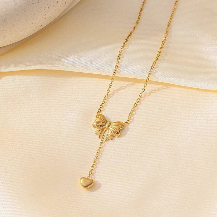 2024 new 18k gold clavicle chain titanium steel necklace design sense bow water drop love chain does not fade Glossy.pk