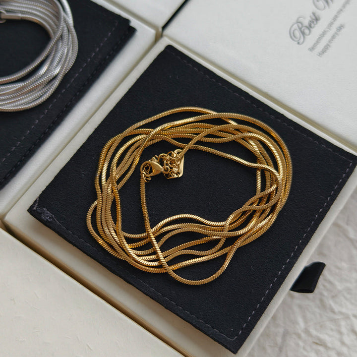European and American snake bone chain long necklace women's simple layering basic bare chain sweater chain titanium steel non-fading sweater chain Glossy.pk