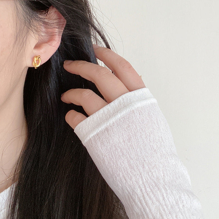 European and American simple design, knotted, entangled, twisted, small studs, niche, delicate, retro, high-end, silver needle earrings, women Glossy.pk
