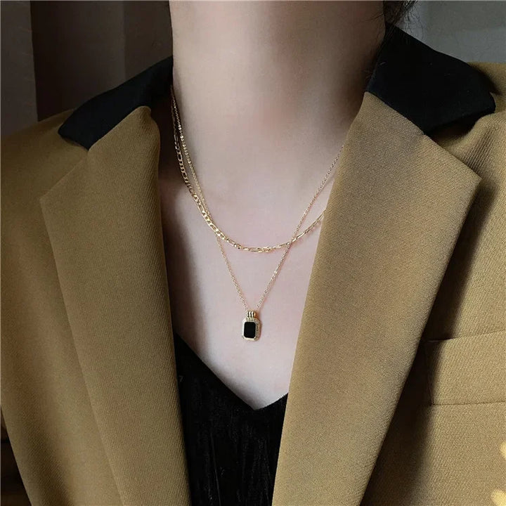 Aviho design sense double layered black epoxy necklace light luxury niche ins style titanium steel sweater chain does not fade