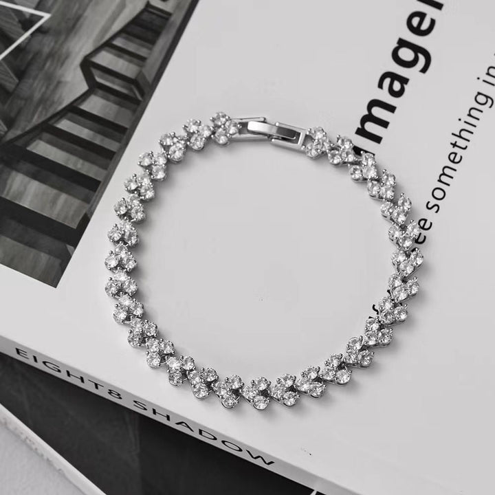 European and American ultra-flashing zirconia roman bracelet 2024 new women's niche design sense diamond delicate Cuban hand jewelry Glossy.pk