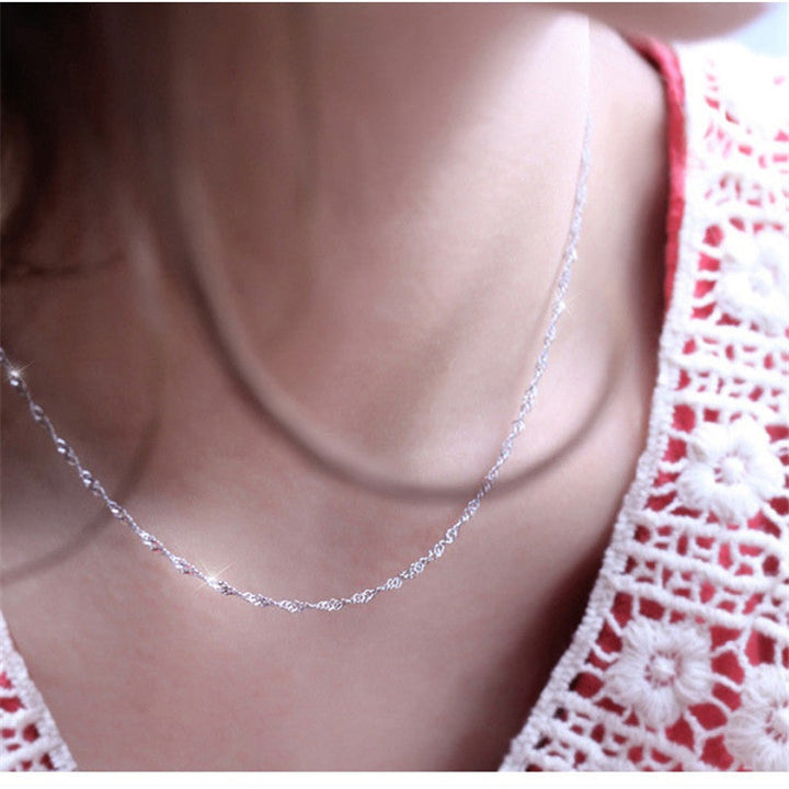 AliExpress cross-border supply European and American silver-plated necklace women's encrypted water wave chain pendant with chain short clavicle necklace Glossy.pk