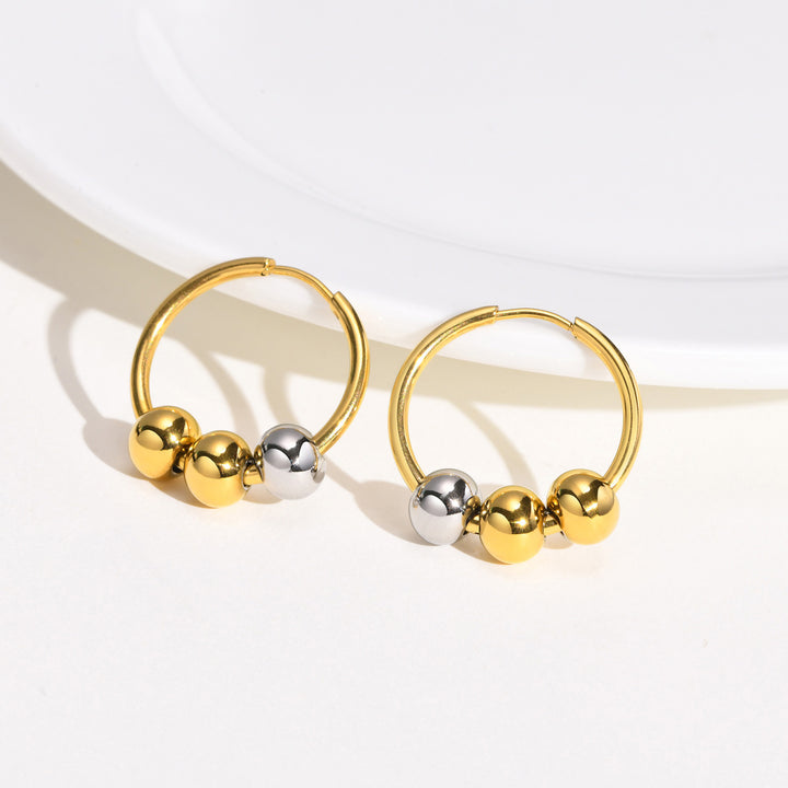 European and American hot cross-border wholesale cold wind metal earrings Internet celebrity niche design sense retro exaggerated new earrings
