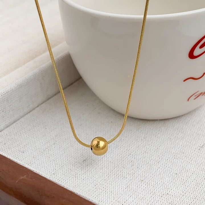 Single small gold bean pendant titanium steel does not fade necklace with ball Bing when to run necklace simple clavicle chain women Glossy.pk