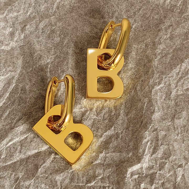 European and American cross-border earrings wholesale love butterfly letter earrings stainless steel light luxury exaggerated sense of luxury does not fade 18 Glossy.pk