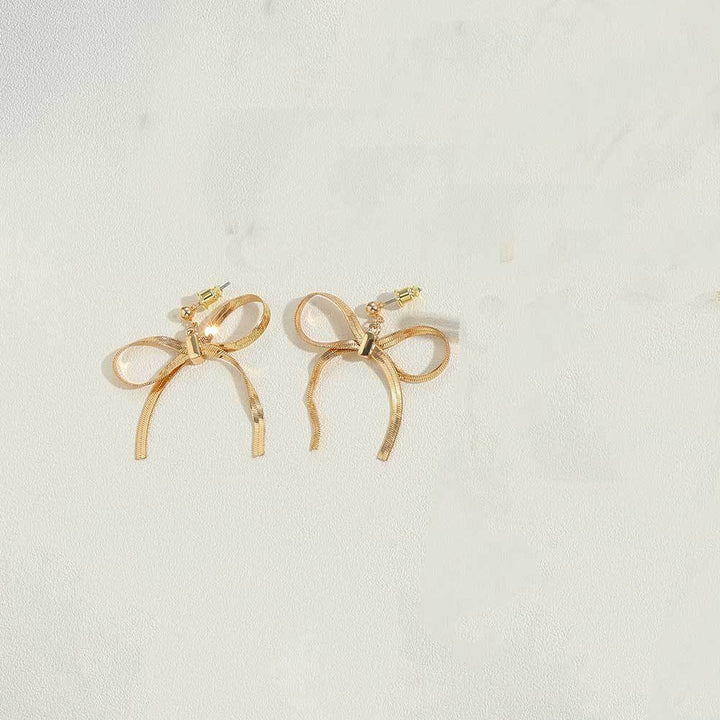 European and American cross-border earrings wholesale love butterfly letter earrings stainless steel light luxury exaggerated sense of luxury does not fade 18 Glossy.pk