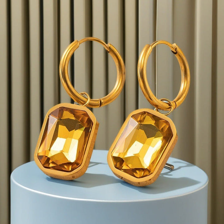 European and American cross-border fashion new niche micro inlaid titanium steel plated 18K gold chamfered rectangular zircon pendant earrings wholesale Glossy.pk