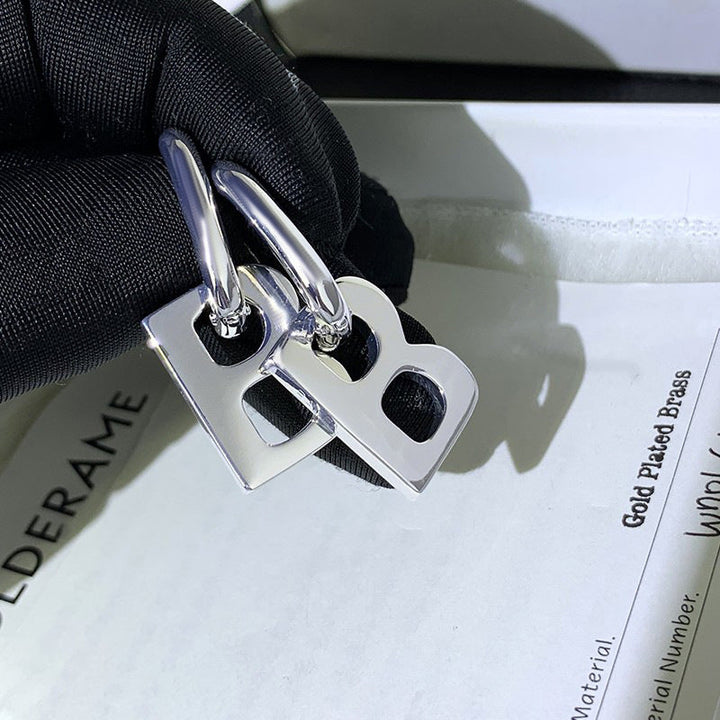 European and American cross-border earrings wholesale love butterfly letter earrings stainless steel light luxury exaggerated sense of luxury does not fade 18 Glossy.pk
