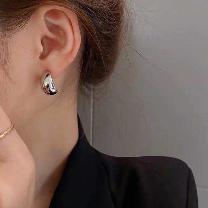 European and American cross-border wholesale small golden bean earrings are simple, Xiao Qiao is cold, metallic earrings, and niche girls do not fade Glossy.pk