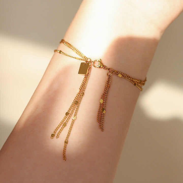 European and American sense of luxury, niche, light luxury, sparkling, three-layer tassel gentle bracelet, titanium steel plated with 18K gold, does not fade