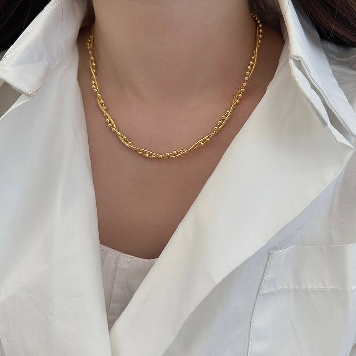 European and American cross-border wholesale water wave winding twist chain clavicle chain simple snake bone chain gold-plated ladies titanium steel jewelry Glossy.pk