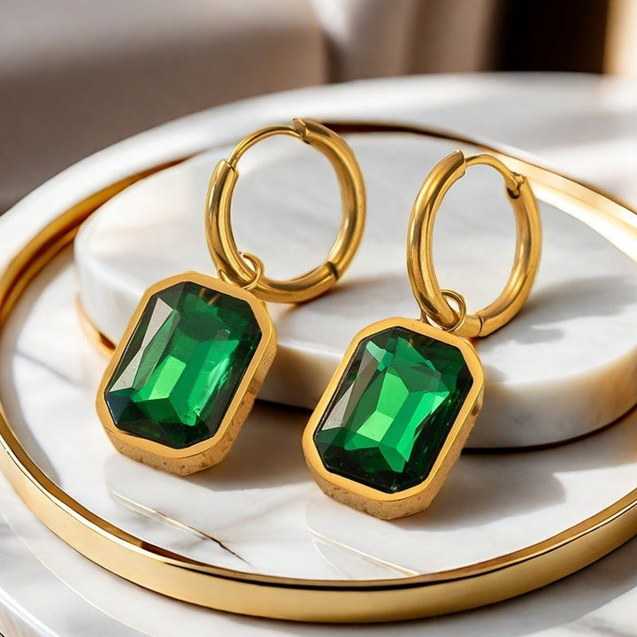 European and American cross-border fashion new niche micro inlaid titanium steel plated 18K gold chamfered rectangular zircon pendant earrings wholesale Glossy.pk