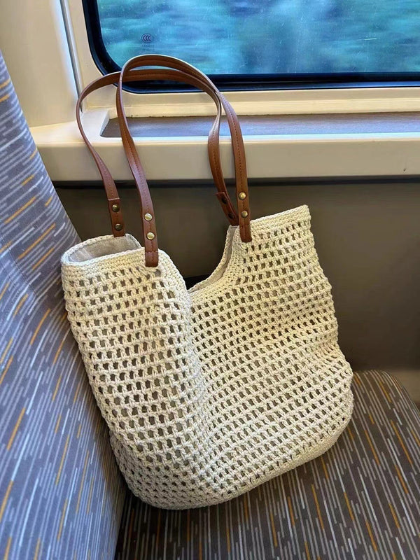 Casual large capacity shoulder cotton thread woven bag new cutout mesh tote bag seaside resort beach bag women's bag Glossy.pk