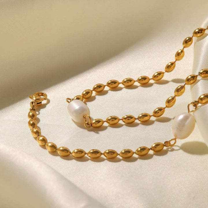 European and American ins style Internet celebrity necklace women's niche non-fading natural freshwater pearl oval gold bean titanium steel necklace Glossy.pk