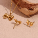 2024 new 18k gold clavicle chain titanium steel necklace design sense bow water drop love chain does not fade Glossy.pk