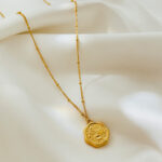 Sense of luxury, niche, irregular medals, peach blossom imprints, titanium steel necklace jewelry, women's 18K gold ins, net red clavicle chain