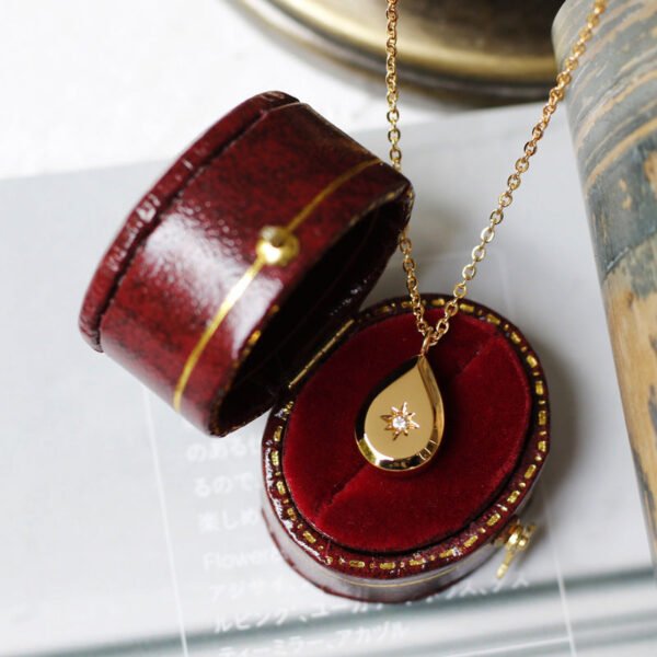 Water Drop Eight Star Necklace product photo 4 | Glossy.pk Pakistan