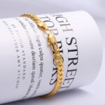 ZHONGYI TEMU NEW PERSONALIZED WOMEN'S 18K GOLD PLATED NECKLACE EUROPEAN AND AMERICAN CROSS-BORDER ACCESSORIES EMBOSSED 4MM GOLD NECKLACE WHOLESALE Glossy.pk