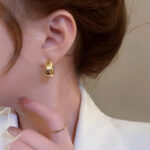 European and American cross-border wholesale small golden bean earrings are simple, Xiao Qiao is cold, metallic earrings, and niche girls do not fade Glossy.pk