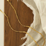 European and American cross-border wholesale water wave winding twist chain clavicle chain simple snake bone chain gold-plated ladies titanium steel jewelry