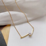 Light luxury niche cross pearl clavicle chain cold style minimalist design temperament versatile women's wholesale price jewelry