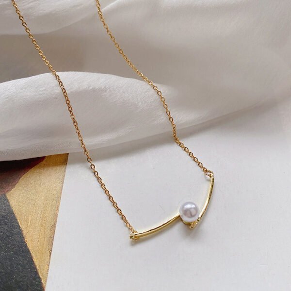 Cross Pearl Clavicle Chain — Minimalist Necklace (style) product photo 2 | Glossy.pk Pakistan