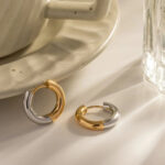 European and American INS style creative splicing 18k gold-plated stainless steel jewelry gold and silver hoop earrings women's jewelry does not fade Glossy.pk