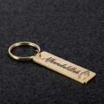 Cross-border hot sale stainless steel small strip personality creative tranquility prayer stainless steel small strip keychain pendant Glossy.pk