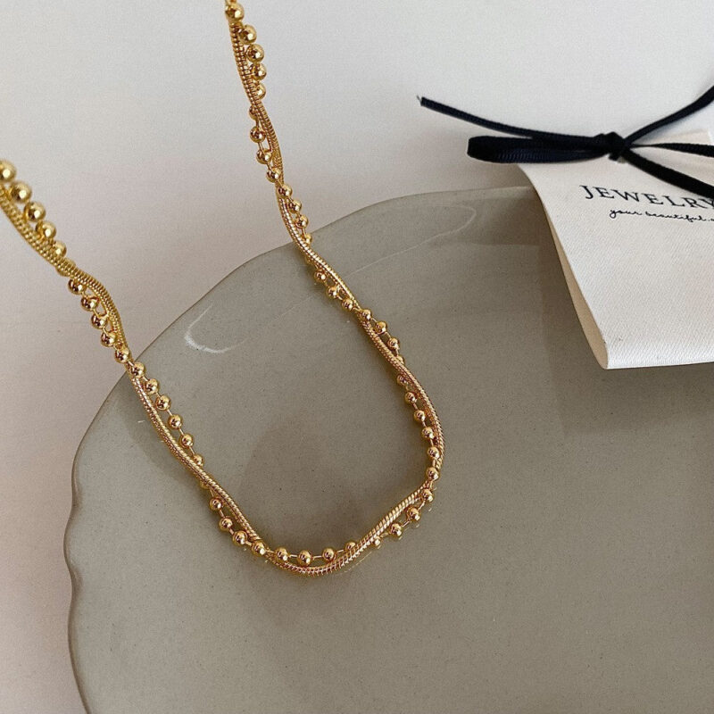 European and American cross-border wholesale water wave winding twist chain clavicle chain simple snake bone chain gold-plated ladies titanium steel jewelry