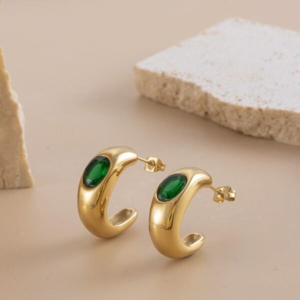 Fashion simple metal oval white gem emerald palace creative metal stud earrings female anti-tarnish jewellery from Glossy.pk, Lahore
