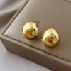 C-shaped Semi-Round Earrings — Gold & Steel Colours product photo 3 | Glossy.pk Pakistan
