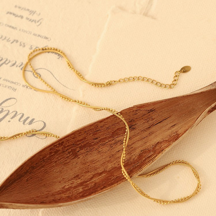 European and American cross-border wholesale water wave winding twist chain clavicle chain simple snake bone chain gold-plated ladies titanium steel jewelry