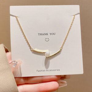 Cross Pearl Clavicle Chain — Minimalist Necklace (style) product photo 4 | Glossy.pk Pakistan