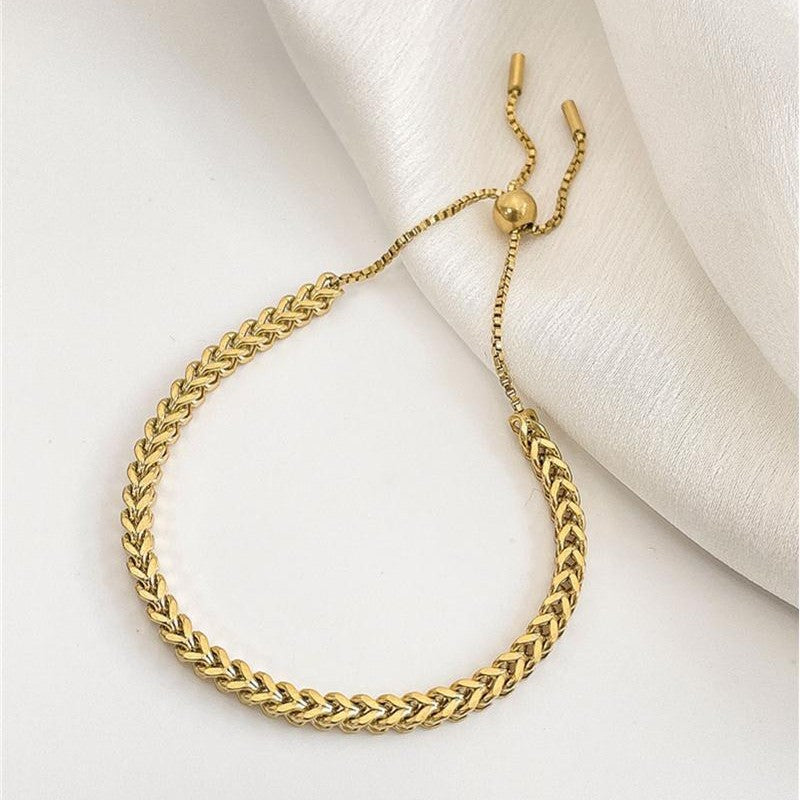 European and American popular wholesale design sense pull-out braided titanium steel bracelet in niche design does not fade hand ornament female girlfriend Glossy.pk