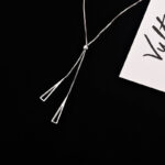 The best-selling titanium steel in Europe and the United States does not fade tassel pull-out light luxury necklace, women's tide Internet celebrity clavicle chain is niche and simple Glossy.pk