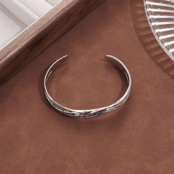 Wave Braided Bracelet — Irregular Hollow Style product photo 2 | Glossy.pk Pakistan
