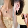 Mother-of-pearl Pendant Special-shaped Unique Black and White Love Necklace Stud Set Temperament Simple Female anti-tarnish jewellery from Glossy.pk, Lahore