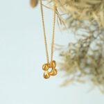 New light luxury, exquisite, fashionable, versatile, temperament, personality, rotating flowers, titanium steel necklaces, niche stud earrings set wholesale Glossy.pk