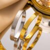 8mm Bracelet in Gold & Steel Colours with Symbol Buckle — jewellery from Glossy.pk, Pakistan