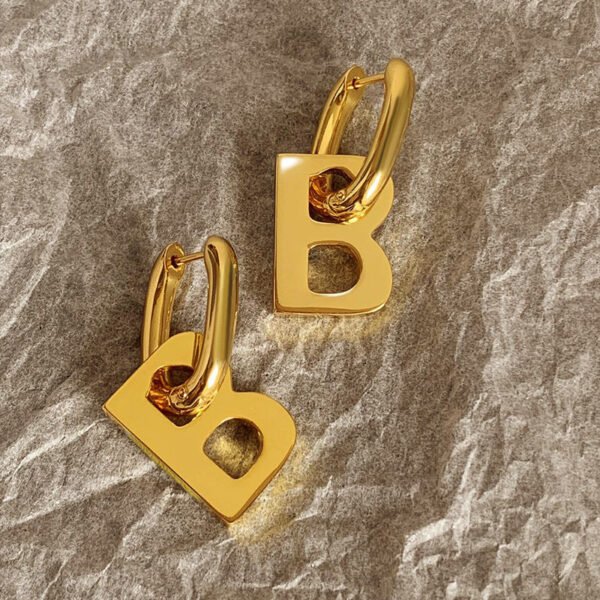 Love butterfly letter earrings stainless steel light luxury exaggerated sense of luxury anti-tarnish jewellery from Glossy.pk, Lahore