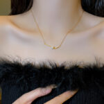 Light luxury niche cross pearl clavicle chain cold style minimalist design temperament versatile women's wholesale price jewelry