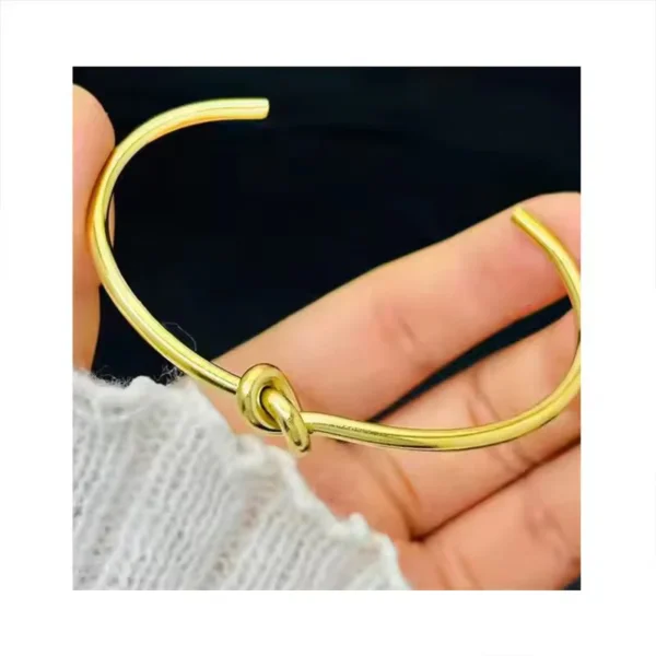 Knotted C Cuff Bangle — Gold-Tone Stainless Steel | Glossy.pk product photo 2 | Glossy.pk Pakistan