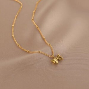 Mini Bow Heart Necklace — Gold-Finish Stainless Steel