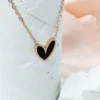 Black Heart Trendy Love Pendant — Gold Finish product photo 2 | Glossy.pk Pakistan