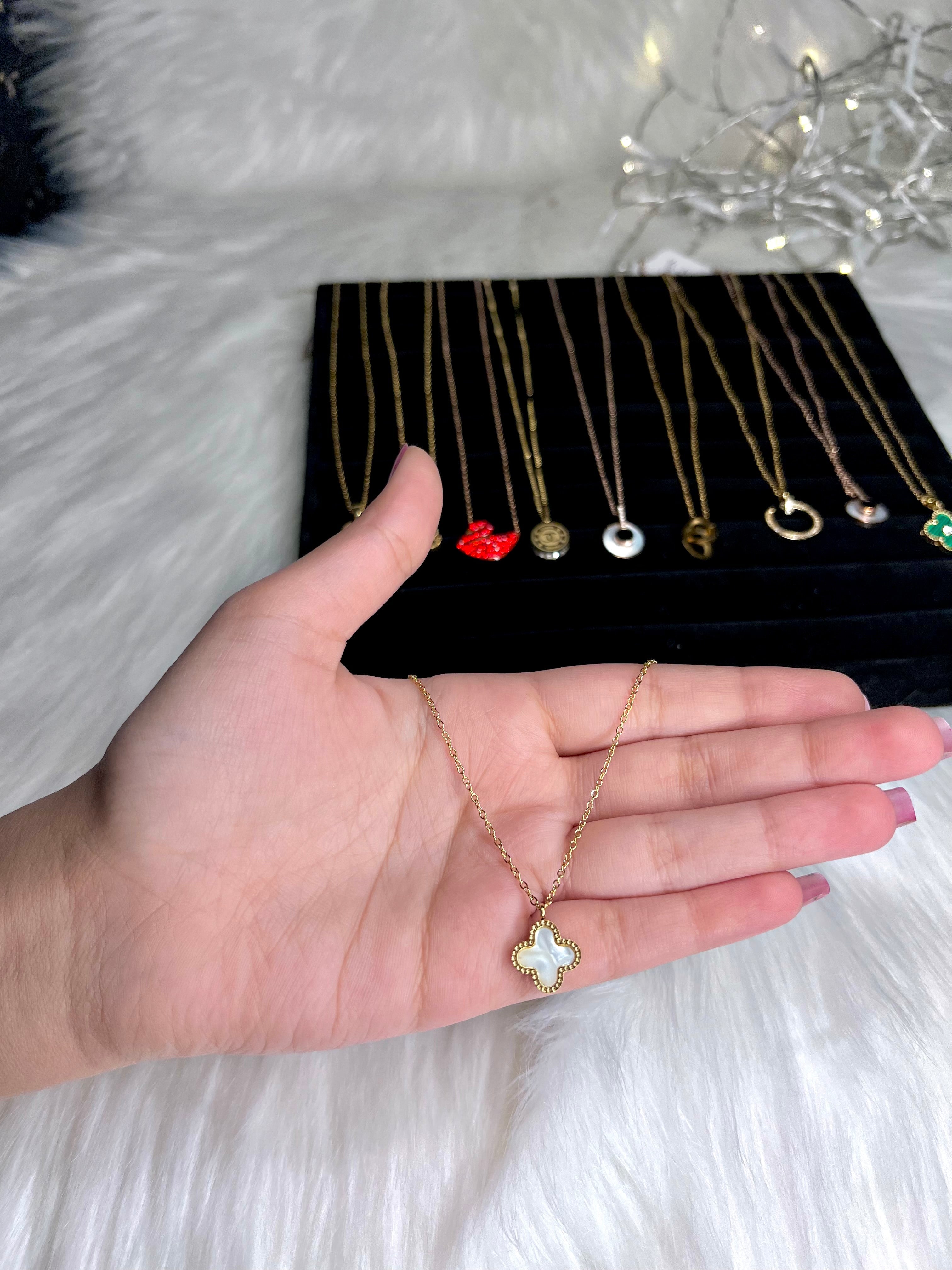 26DC02FE-43C1-45AF-9858-7E798E7C5033 White Vancleef Necklace - Image 1