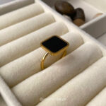 Black and white square ring