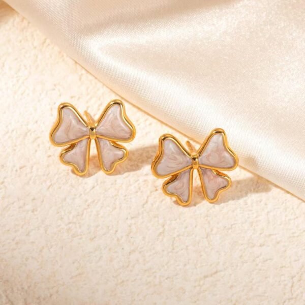 Bow Stud Earrings (Black, White) product photo 3 | Glossy.pk Pakistan