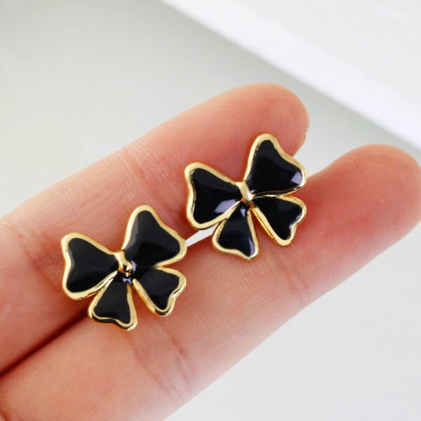 Bow Stud Earrings (Black, White) product photo 2 | Glossy.pk Pakistan