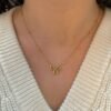 Bow Ribbon Pendant Necklace — Stainless Steel product photo 2 | Glossy.pk Pakistan